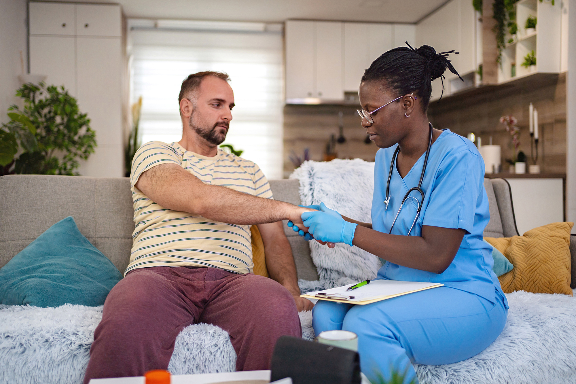 Health consultation in a cozy living room setting Remote Wound Care